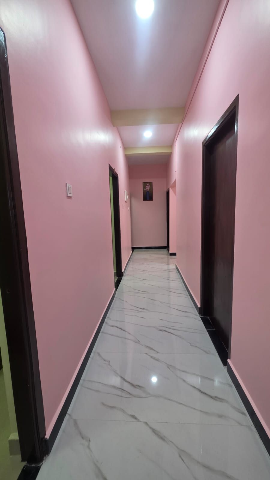 Marble Corridor at Family Comfort Residency